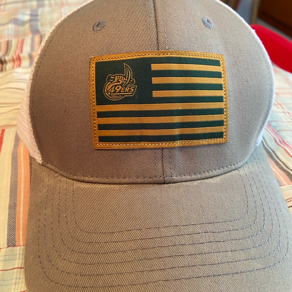 2 Charlotte 49ers hats.  One green and one gray